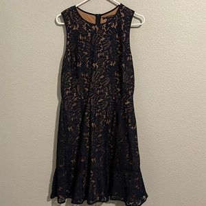 Navy lacy blue dress with tan slip under it. Size 12. Banana Republic